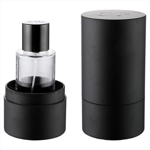 Flacon de parfum rond en verre de 50ml 100ml avec bouchon de parfum magnétique et boîte en papier cadeau - Product Image 1