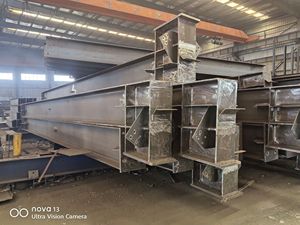 Estructuras de acero fabricadas a medida | Vigas H soldadas, tubos redondos perforados y placas de conexión de acero para la construcción