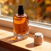 Flacon de parfum en verre cylindrique de luxe 30ml 50ml avec surface givrée et pompe pulvérisatrice à capuchon rose