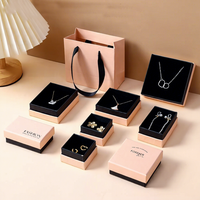 Boîtes à bijoux bicolores Becan avec base noire, couvercles lumineux et poignées pour l'emballage de colliers, bagues et boucles d'oreilles