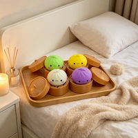 Jouet anti-stress coloré en forme de chignon avec mini étui vapeur, idéal pour les cadeaux de fête, les jeux sensoriels pour enfants et les cadeaux promotionnels.