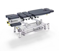 Table d'opération de physiothérapie électrique professionnelle pour lit chiropratique de soins sportifs