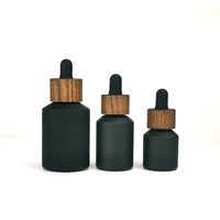 Flacon en verre noir mat à épaule inclinée 15 ml 30 ml 60 ml 100 ml 125 ml 200 ml Flacon cosmétique avec fermeture en bois