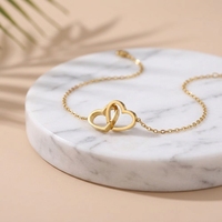Bracelet en alliage à double anneau entrelacé en forme de cœur, style international, best-seller, avec double fermoir, également utilisable comme bracelet de cheville, cadeau sur le thème de l'amour, bijou de main