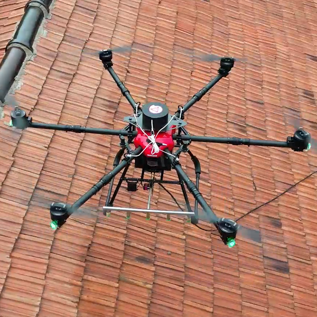 Intelligent Drone Cleaning System for Exterior Maintenance with High Efficiency Water Spray and Stable Flight Technology