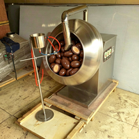 Machine automatique de glaçage au chocolat pour fruits secs enrobés de pistaches croustillantes, grains de café et noisettes dans un sirop