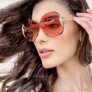 Lunettes de soleil pour femmes tendance vintage 2020, verres dégradés, UV400, sans monture, surdimensionnées - Product Image 1