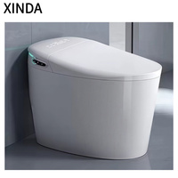 WC intelligent de luxe moderne en céramique monobloc allongé avec télécommande, fixation au sol, désodorisation automatique et double chasse d'eau