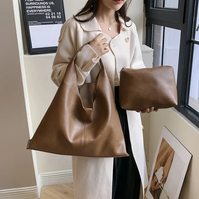 Çin mükemmel kalite sıcak satış moda özelleştirilmiş Pu deri büyük üçgen Zongzi tembellik Crossbody bir kol çantası çanta