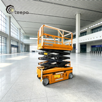 Plateforme élévatrice à ciseaux spacieuse et large pour le transport d'outils et de matériaux destinés aux opérateurs lors des opérations de maintenance d'hangars aériens
