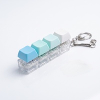 En gros Porte-clés Fidget Clavier Macaron Crème, Jouet à Cliquement ASMR, Keycap Pastel, Anti-stress et Décompression, Cadeau de Bureau