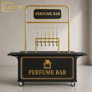 Comptoir de parfumerie mobile haut de gamme noir avec éclairage LED doré, chariot portable pour événements - Product Image 1