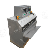 Machine de remplissage, de scellage et d'emballage de sachets en forme de bouteille d'eau pure