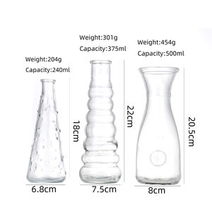 ग्लास सिंगल बड विंटेज उभरा हुआ फूल फूलदान घर की शादी के लिए थोक में स्पष्ट बड फूलदान मिनी प्यारा ग्लास फूलदान - Product Image 1