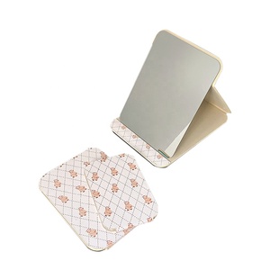 Espejo de maquillaje de alta definición para mujer escritorio vertical <span class=keywords><strong>plegable</strong></span> de cuero Pu diseño exquisito portátil para el hogar Ins Wind al por mayor - Product Image 2