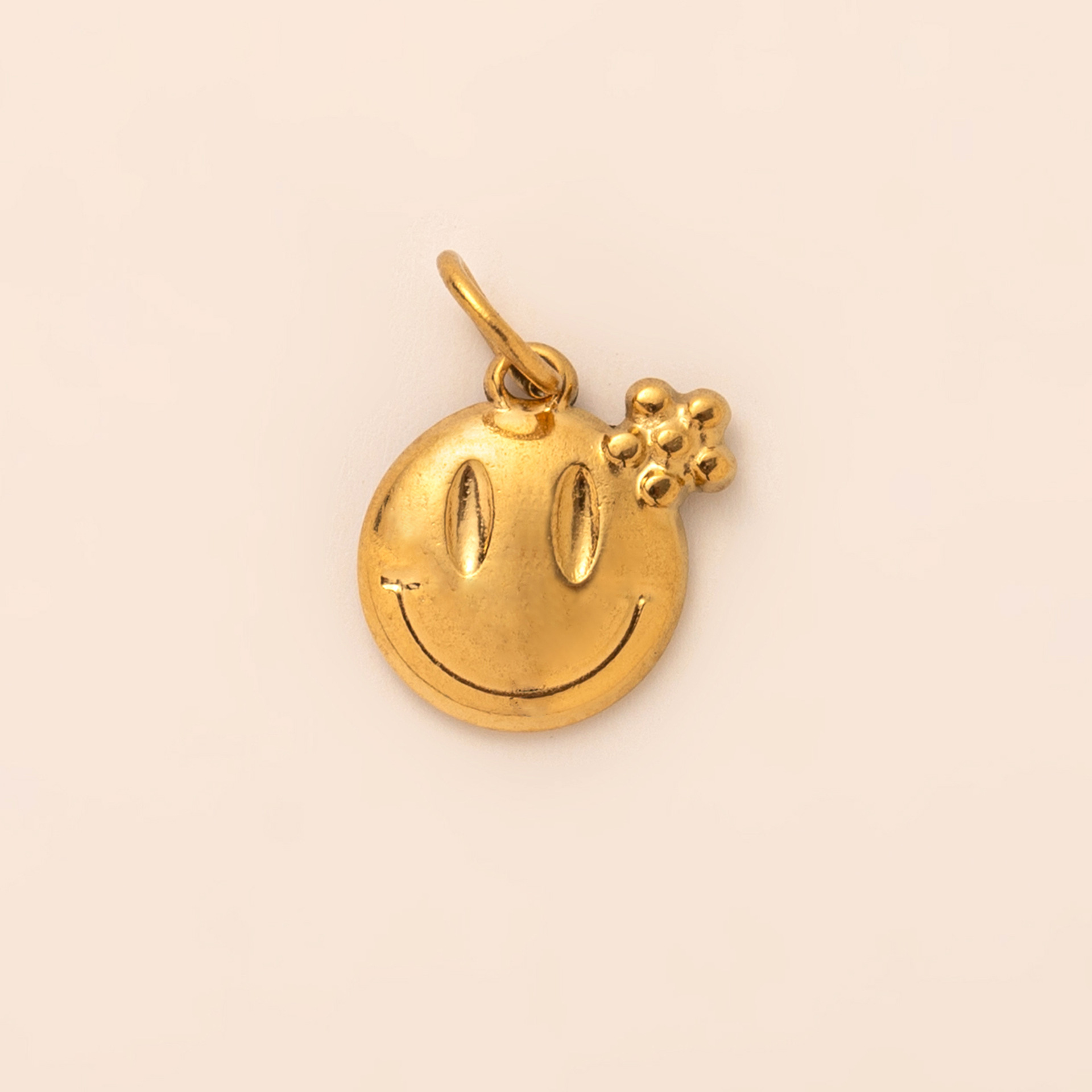 Pendentif visage souriant