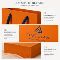 Sac en papier personnalisé de luxe, orange vif, en papier d'art recyclé et couché, avec estampage à chaud doré pour la marque haut de gamme