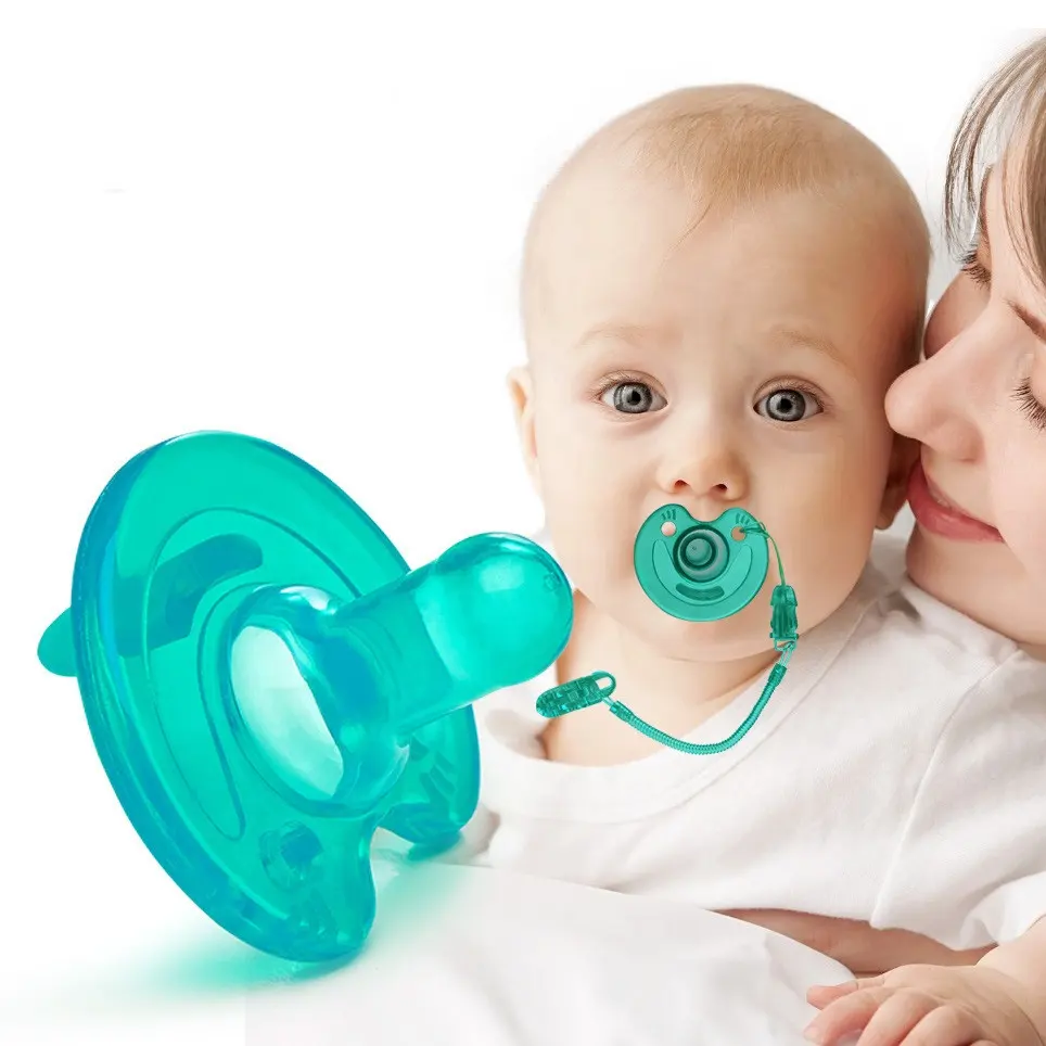 ซิลิโคนเหลวปลอดสารพิษปราศจากสาร BPA พร้อมกล่องเก็บและคลิปการออกแบบชิ้นเดียวผลิตภัณฑ์จุกนมผลไม้สำหรับเด็กทารกกัดฟันเกรดอาหาร