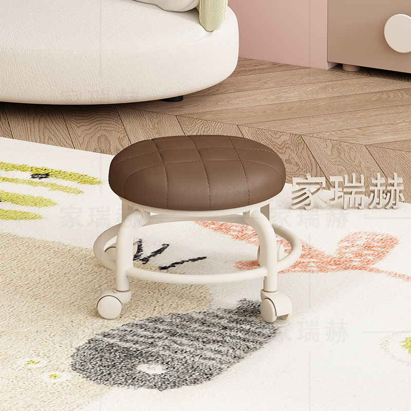 Cojín redondo suave [acolchado] color café.