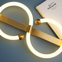 Lampe murale LED en fer et acrylique de style italien minimaliste en forme de S pour salon et chambre à coucher, éclairage de luxe