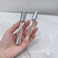 Flacon pulvérisateur cylindrique double tête en verre, marron transparent, portable, rechargeable pour parfum, longue distance - B1