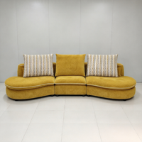 Canapé de salon populaire pour grande villa, ensemble de canapés modernes et élégants en tissu nuage pour usage domestique, nouveau canapé incurvé créatif de designer