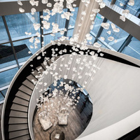Lustre en verre transparent en forme de roche irrégulière, luminaire suspendu personnalisé pour escalier en colimaçon, hall d'hôtel