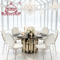 Tables et chaises rondes de luxe en acier inoxydable argenté au design moderne pour mariage
