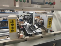 Chine Machine à coudre semi-automatique à double pièce pour boîtes en carton Machine à coudre les feuilles en carton Corrugados
