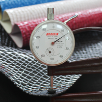 Rouleau de cuir PVC à motif de pierre concave à haute brillance, cuir pour sac à main, matériau de revêtement en cuir