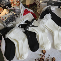 Chaussettes en coton blanc et noir pour femmes avec volants en dentelle, détail de nœud tendance, tricotées, séchage rapide, respirantes, usage quotidien, vente en gros