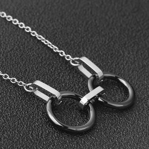 Collier en acier inoxydable avec pendentif en céramique à double anneau, design géométrique noir et blanc pour femmes, à porter au quotidien, cadeau - Product Image 3