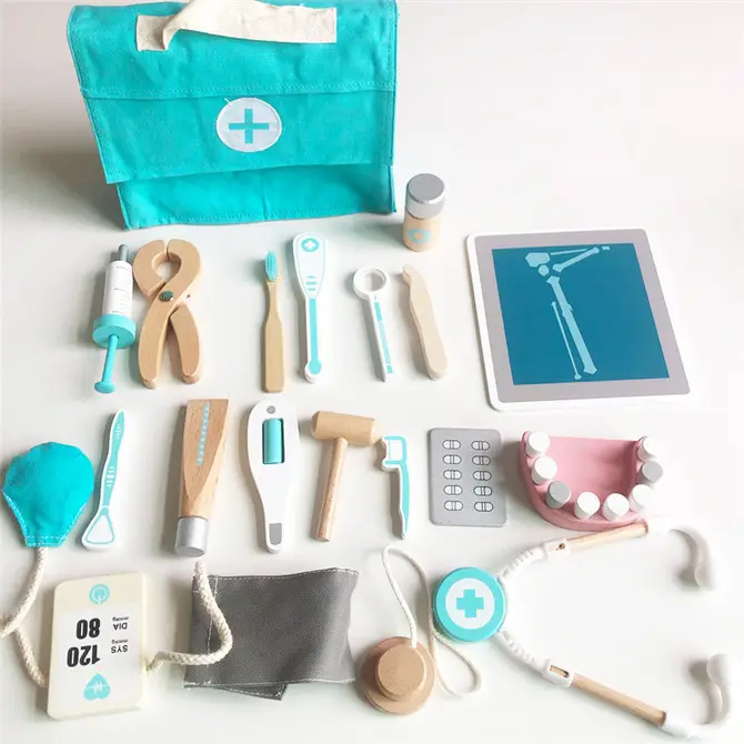Il petto medico della medicina di simulazione dei bambini ha messo i giocattoli educativi del dottore del gioco di finta di legno