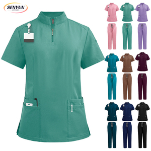 Ensemble d'Uniforme Médical pour Femme 2 Pièces avec Logo Personnalisé, de Haute Qualité, Couleur Unie, Col Montant, Taille Extensible et Jambe Droite - Product Image 1