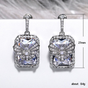 Orecchini pendenti da donna classici in rame placcato oro bianco con fiocco e zirconi, gioielli alla moda - Product Image 5