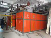 Chaudière à eau chaude industrielle entièrement automatique à haute efficacité - 98% d'efficacité thermique pour les secteurs chimiques et textiles