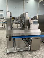 Machine de chargement automatique de plateaux Hengyuan efficace pour le pain, les gâteaux, les pâtisseries et autres produits de boulangerie, capacité essentielle pour le type farineux