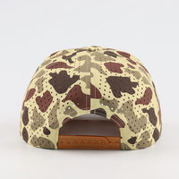 Casquette de baseball classique noire à pois camouflage en tissu Dobby avec logo en patch de caoutchouc unique, perforations laser et boucle en cuivre doré, idéale pour le golf