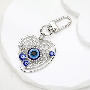 Porte-clés tendance œil de démon, main de Fatima, pendentif paume, bijou populaire pour femmes, pour clés de voiture et sacs d'école - Product Image 3