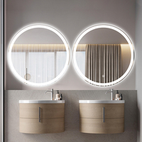 Miroir LED intelligent rond givré à écran tactile avec éclairage pour hôtels et salles de bain