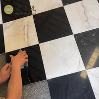 Carreaux de sol modernes en marbre Calacatta blanc mélangé Nero noir, polis, étanches, découpés sur mesure pour villas, appartements et salles de bain