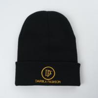 Grosir Beanie rajut akrilik uniseks kustom topi harian penjualan laris musim dingin dengan pola kotak-kotak pita kamuflase Logo bordir