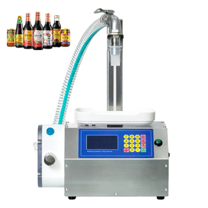 Petite machine de remplissage à pompe doseuse pour transfert de liquides, idéale pour la mélasse, les sauces, les pâtes et le lait - Product Image 1