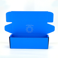 Caja de Cartón Corrugado con Lámina Azul Personalizada para Camisetas, Embalaje para Envío de Ropa, Proveedor Especializado en Embalaje Personalizado para Marcas de Ropa