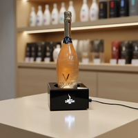 Présentoir rotatif pour bouteilles de champagne dorées avec paillettes scintillantes Revolve Gold Flakes Sparkling Led Bottle Glorifier