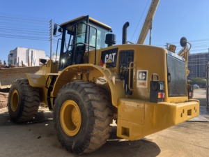รถตักล้อยาง CAT 966L มือสอง เครื่องยนต์ Caterpillar รับน้ำหนักได้ 9 ตัน สีเหลือง อุปกรณ์ก่อสร้างสำหรับงานดิน - Product Image 2