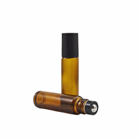 Vente en gros de bouteilles à rouleaux en verre transparent de 8ml 10 ml avec inserts en rouleau de verre et bouchons noirs blancs