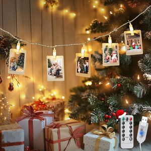 Aigostar 2M 10LED stringa di luci calde lucine bianche con 10 morsetti foto e telecomando appesa stile per feste - Product Image 1