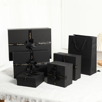 Boîte cadeau noire rigide écologique avec ruban à nœud gaufré, emballage de luxe pour les cadeaux d'anniversaire et de célébration