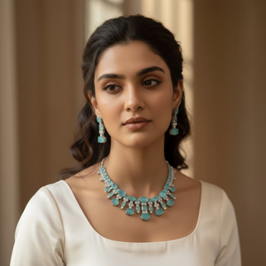 Ensemble collier et boucles d'oreilles Aqua Bloom Royale, composé de pierres ovales et rondes de qualité supérieure en bleu aqua, parfait pour les fêtes et les mariages. - Product Image 1
